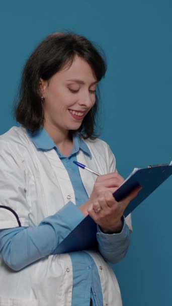 Vertical Video Female Scientist Taking Notes Clipboard Documents Writing Formula — Vídeo de Stock