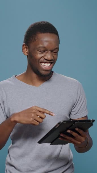 Vertical Video Young Adult Laughing Social Media App Digital Tablet — Αρχείο Βίντεο