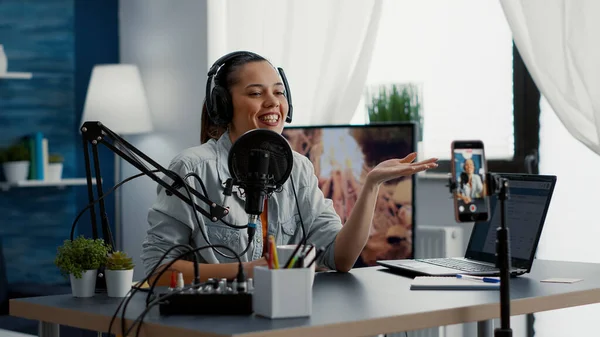 Influencer Putting Headphones While Recording Video Phone Talking Audience Joyful — Stockfoto