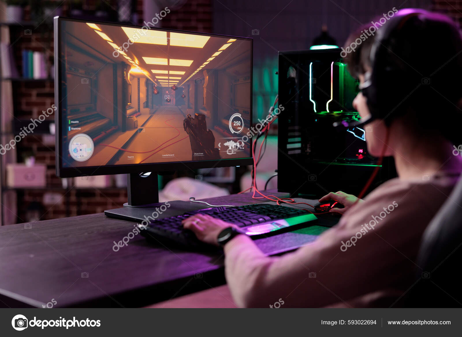 Gaming controller in hands, playing games and online streaming with gamer  competition and esports. Video game tech, streamer person in dark room and  play tournament with joystick and keyboard Stock Photo