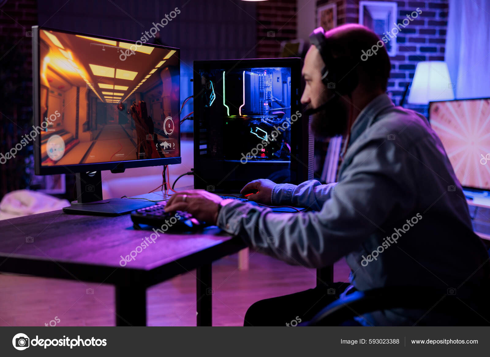 Free Photo  Person playing video games with controller on computer. player  using joystick and wearing headphones to play online game on monitor.  modern man using gaming equipment to have fun.