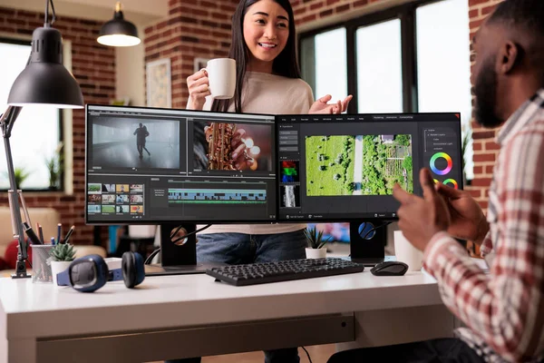 Diverse Freelancers Editing Film Footage Computer Using Movie Making Software — 图库照片
