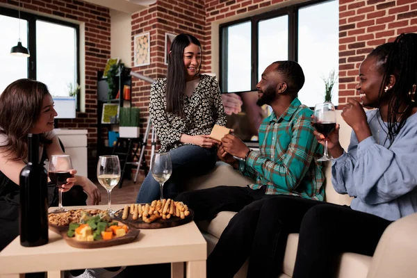 Diverse Group Friends Celebrating Birthday Wine Party While Exchaning Gifts — Fotografia de Stock