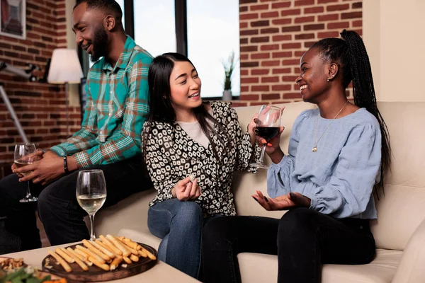 Multiethnic Joyful Women Wine Party Talking While Sitting Sofa Happy — 스톡 사진