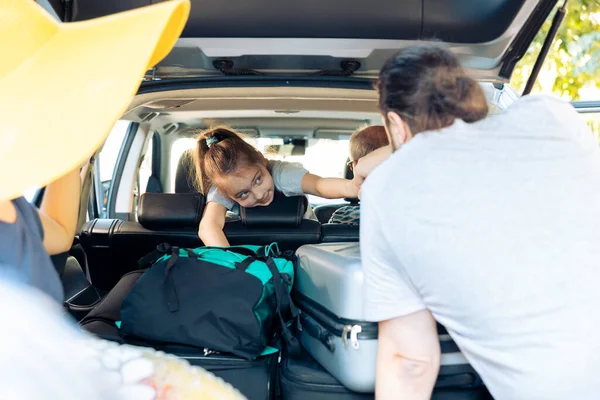 Small Child Car Leaving Vacation Parents Grandparents Loading Travel Bags — Stok fotoğraf
