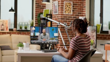 Freelancer talking on manager on online videoconference call, attending business meeting on videocall conference to chat with man. Using remote teleconference connection, virtual discussion.