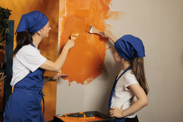 Adult Kid Painting Orange Walls Acrylic Color Paint Paintbrush Using — Stockfoto