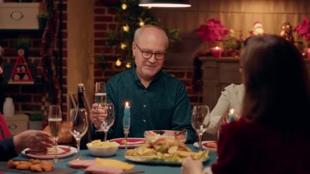 Cheerful Multicultural Family Members Toasting Champagne While Enjoying Christmas Dinner — Stockvideo