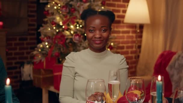 Happy African American Woman Sitting Christmas Dinner Table Relatives While — Video Stock