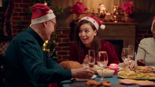 Beautiful Festive Woman Laughing Heartily While Talking Senior Man Christmas — Stockvideo