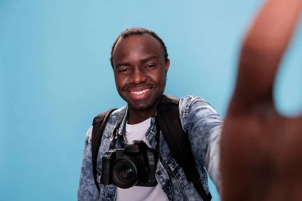 Happy Photographer Having Camera Taking Selfie While Waving Camera Blue —  Fotos de Stock