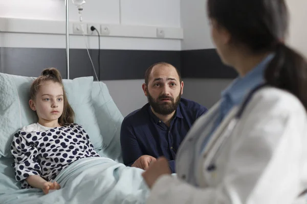 Pediatric Expert Talking Father Hospitalized Sick Little Girl Resting Children —  Fotos de Stock