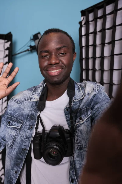 Happy African American Photographer Waving Camera While Taking Selfie Photo —  Fotos de Stock