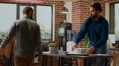 Depressed sad person getting fired from corporate job, packing belongings to leave office. Jobless disappointed man feeling worried about unemployment and career failure, being frustrated.
