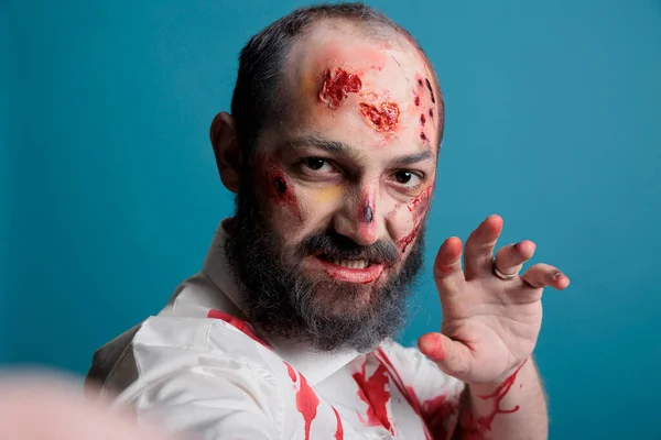 Halloween Zombie Taking Picture Smartphone Looking Crazy Evil Aggressive Studio — Stockfoto