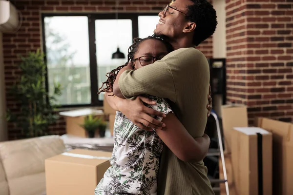 African American Couple Sharing Hug Enjoying Property Relocation Having Romantic — Stok fotoğraf