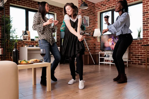 Happy Young Close Friends Dancing Together Living Room While Celebrating — Fotografia de Stock
