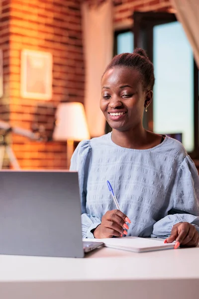 Smiling Female Student Watching Educational Tutorials Laptop Taking Notes Notebook — Fotografia de Stock