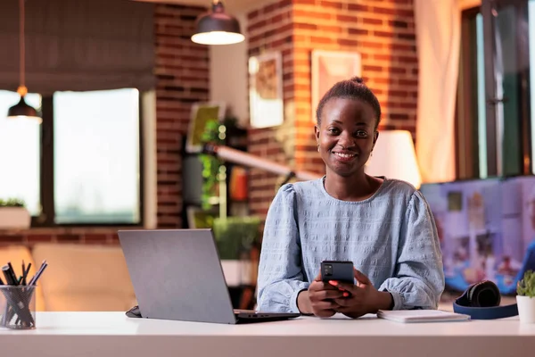 Female Smiling Remote Worker Using Mobile Phone Sitting Home Office — 스톡 사진