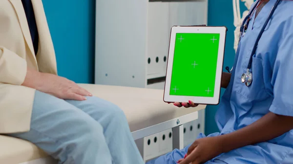 Medical Nurse Patient Looking Greenscreen Tablet Having Appointment Cabinet Specialist — Stock fotografie