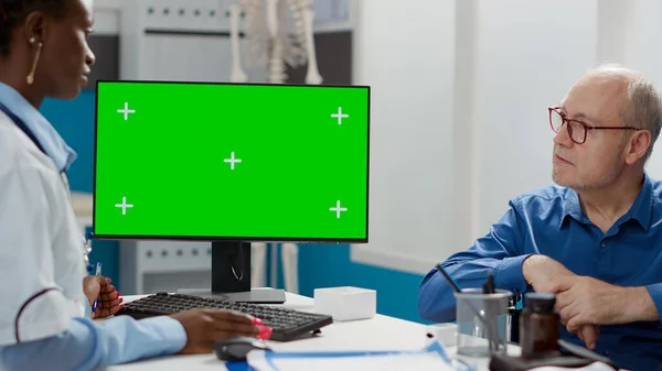 Physician Elderly Man Wheelchair Analyzing Greenscreen Cabinet Medic Patient Physical — Stock fotografie