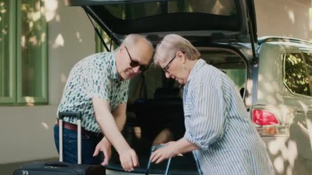 Retired People Loading Voyage Baggage Trolleys Vehicle While Going Holiday — Video