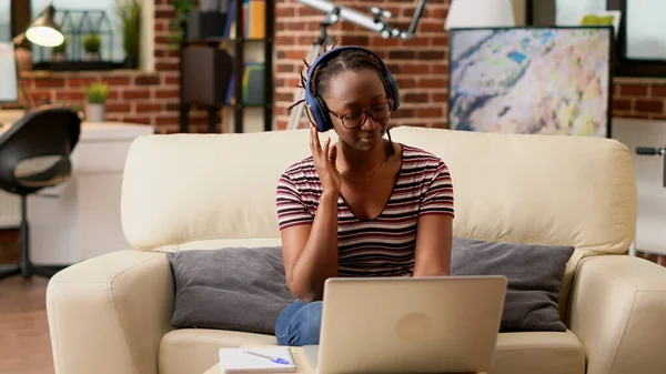 African American Woman Listening Music Working Remotely Laptop Using Internet — Fotografia de Stock