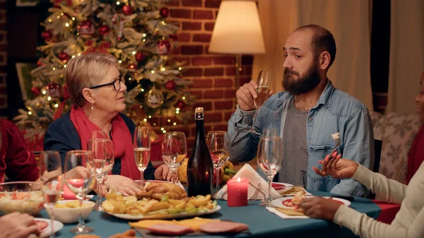 Confident Man Talking Positive Senior Woman While Drinking Sparkling Wine — Stockfoto