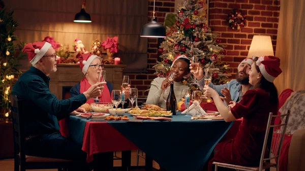 Cheerful Festive People Singing Traditional Songs While Enjoying Christmas Dinner — Photo