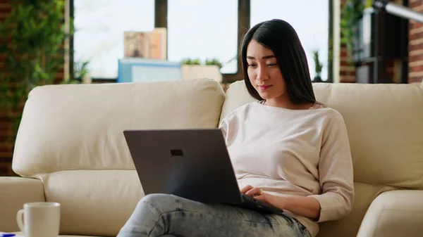 Smiling Office Worker Home Working Remotely Laptop While Sitting Sofa — Zdjęcie stockowe