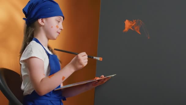 Small Girl Using Paintbrush Create Art Masterpiece Canvas Holding Mixing — Video Stock