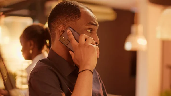 African American Man Talking Mobile Phone Call Office Desk Using —  Fotos de Stock