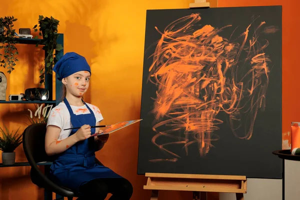 Portrait Young Artist Painting Masterpiece Orange Color Mixing Tray Dye — Fotografia de Stock