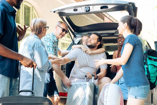 Mixed Family Friends Loading Bags Automobile Trunk Preparing Leave Together — Stockfoto