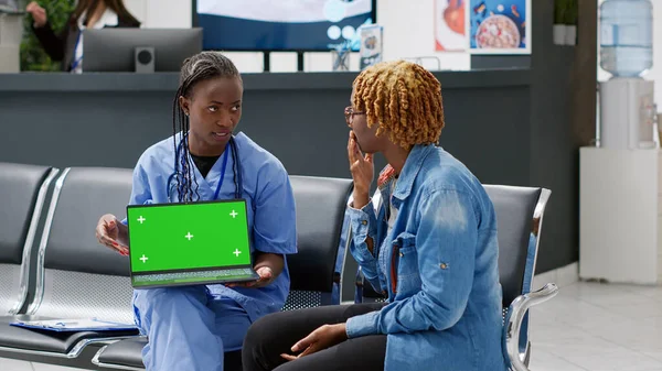 Nurse Patient Looking Laptop Greenscreen Display Consulting Waiting Room Reception —  Fotos de Stock