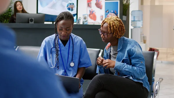 Female Nurse Patient Looking Laptop Find Diagnosis Doing Consultation Clinical — Stockfoto