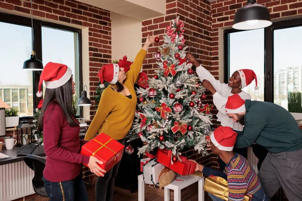Festive People Giving Gifts Christmas Tree Company Office Celebrating Winter — Fotografia de Stock