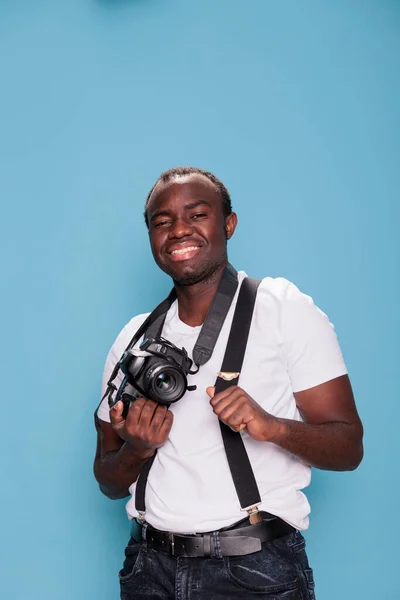 Handsome Confident Professional Photographer Posing While Smiling Joyfully Standing Blue —  Fotos de Stock