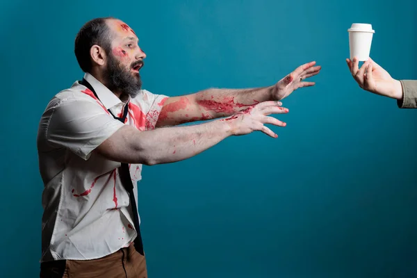 Scary Wounded Corpse Wanting Coffee Cup Studio Blue Background Going — Photo