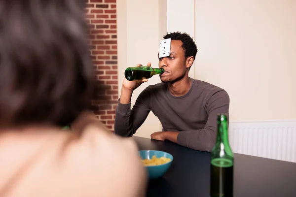 Confident Young Adult Man Plastic Card Forehead Drinking Beer While —  Fotos de Stock