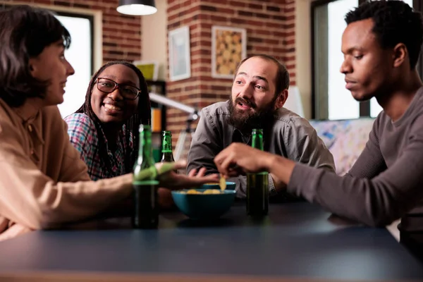 Positive Group Multiethnic Friends Sitting Table While Discussing Having Fun — Fotografia de Stock