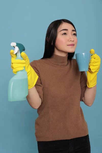 Portrait Young Asian Thinking Woman Taking Coffee Yellow Glove While — Foto de Stock