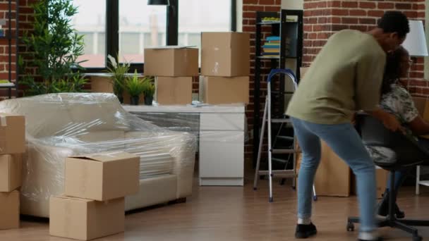 Married Couple Decorating Living Room Apartment Having Fun Furniture Celebrating — Video Stock