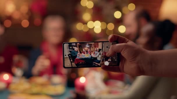 Person Taking Photo Happy People Celebrating Winter Holiday Phone Device — Wideo stockowe