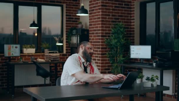 Creepy Mindless Zombie Sitting Office While Working Modern Laptop Spooky — Stock video