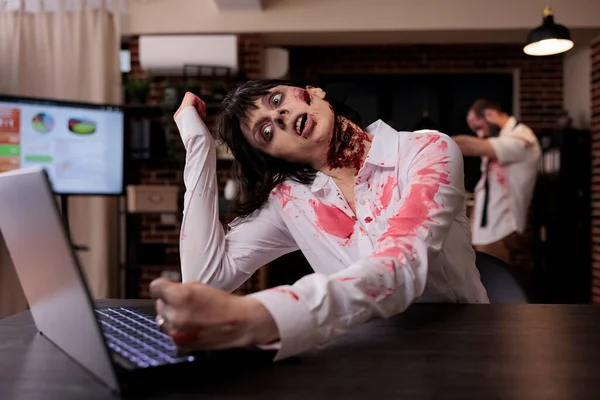 Horror Cruel Zombie Using Laptop Desk Undead Corpse Trying Work — Stok fotoğraf