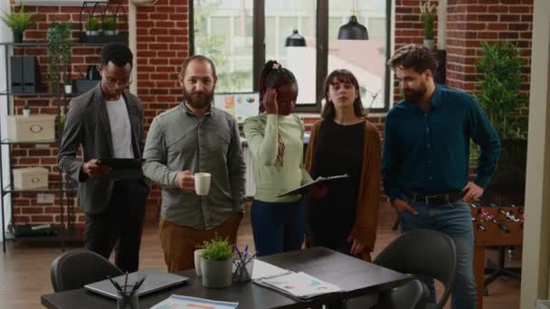 Portrait Diverse Colleagues Team Working Business Office Analyzing Documents Laptop — стоковое видео