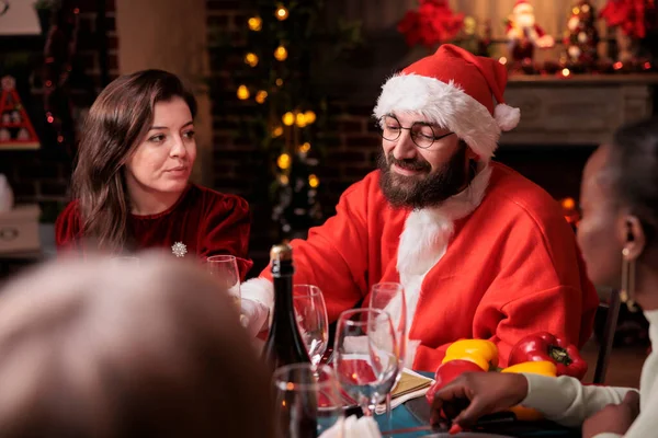 Husband Wearing Santa Claus Costume Celebrating Christmas Wife Parents Drinking — Φωτογραφία Αρχείου