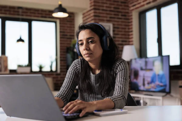 Employee Listening Music Headphones Working Report Laptop Home Doing Remote — Stockfoto
