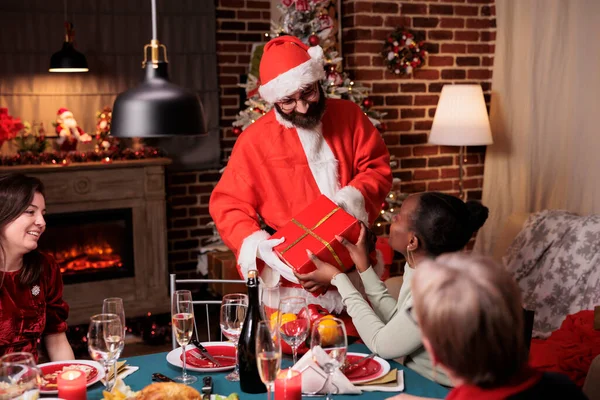 Man Santa Claus Costume Greeting African American Woman Giving Christmas — Stock Fotó